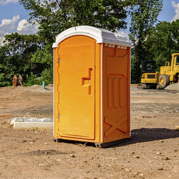 what is the cost difference between standard and deluxe porta potty rentals in East Bradford